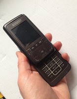 Отдается в дар Телефон- слайдер Alcatel и комплектующие к нему- работоспособность неизвестна