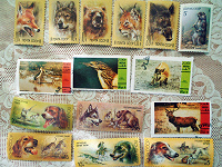 Отдается в дар почтовые марки со зверями и птицами