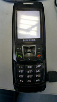Отдается в дар Телефон с зарядкой samsung E250