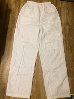 Отдается в дар Белые брюки 48 размер