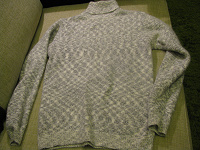 Отдается в дар пуховый свитер 42 размер