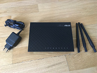 Отдается в дар Wi-Fi-ADSL2+ роутер ASUS DSL-N55