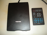 Отдается в дар Флоппи- дисковод(внешний) с пультом Toshiba