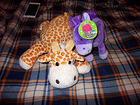 Отдается в дар мягкие игрушки жираф фирмы gulliver и лошадка карусель с биркой