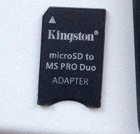 Отдается в дар карта miniSD 1 GB, адаптер для microSD и чехол для жёсткого диска