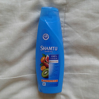 Отдается в дар Маленькая бутылочка шампуня " Shamtu"