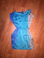 Отдается в дар Платье голубое, атласное.