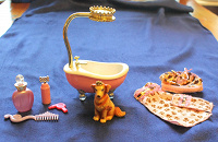 Отдается в дар игрушка собачка-принцесса с ванной