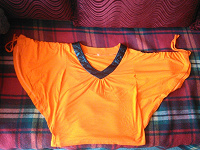 Отдается в дар Фантазийная оранжевая блуза.