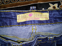 Отдается в дар фирменные джинсы.