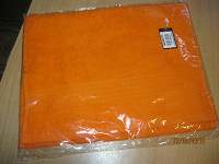Отдается в дар полотенце новое оранжевое