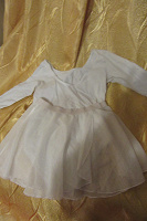 Отдается в дар Гимнастический костюм с юбкой для девочки 5-7 лет.