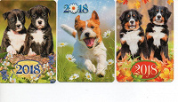 Отдается в дар карманные календарики к году собаки
