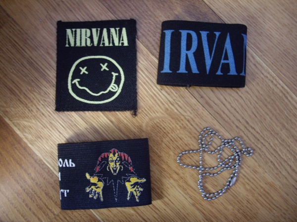 Футболка нирвана мужская серая. Футболка с группой nirvana. Логотип нирваны смайл. Нирвана атрибутика. Атрибут нирваны.